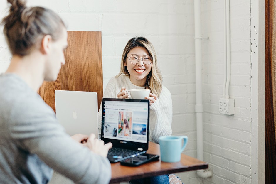 Two people are happy and relax while working online