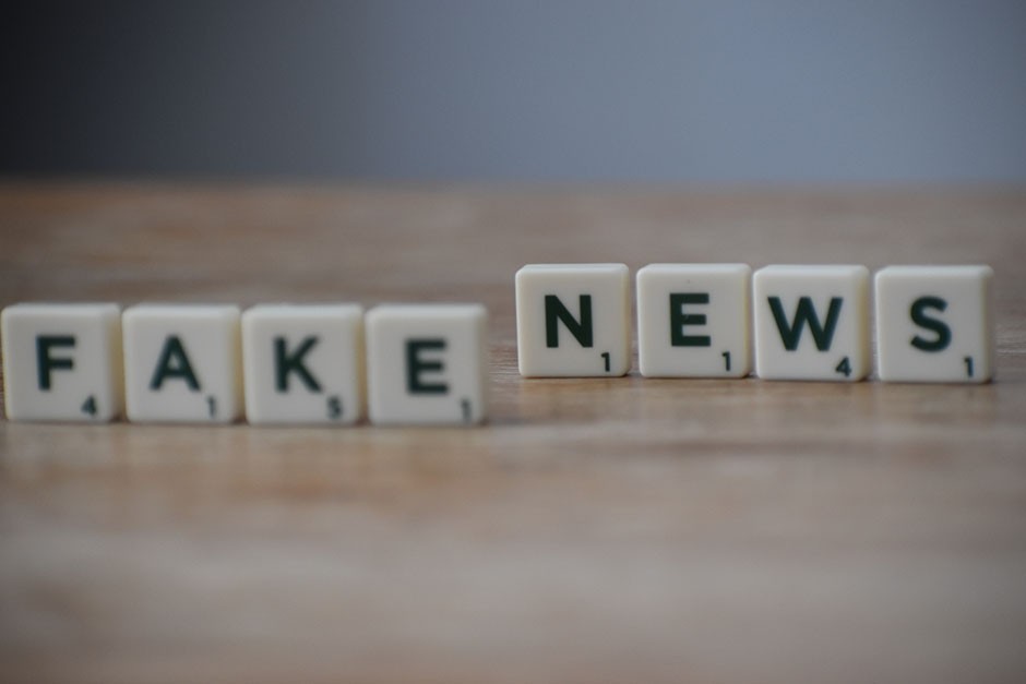 Fake news Boardgame letter tiles arranged to say Fake News