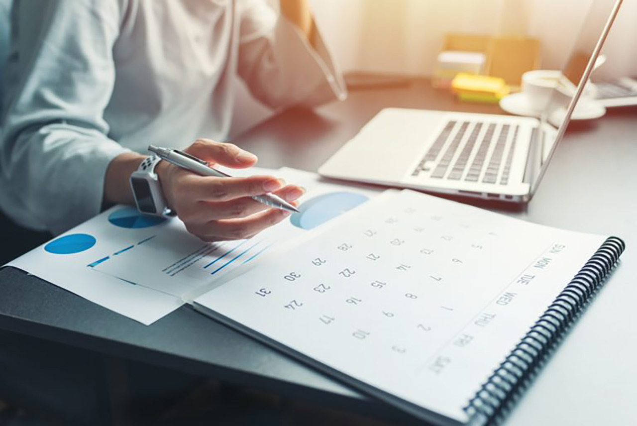 Laptop and calendar