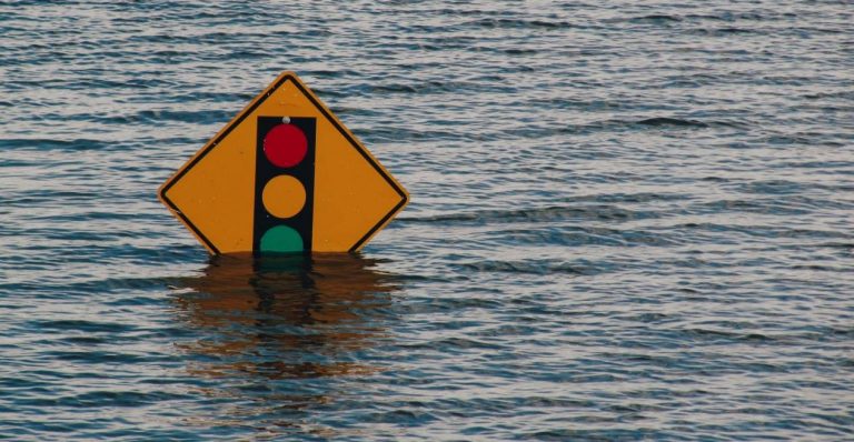 Flooded traffic light sign