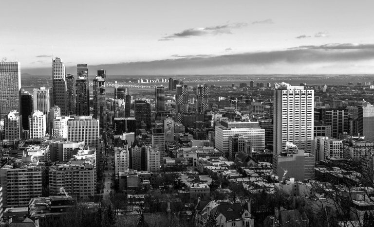 Black and white image of a city skyline seen from above 