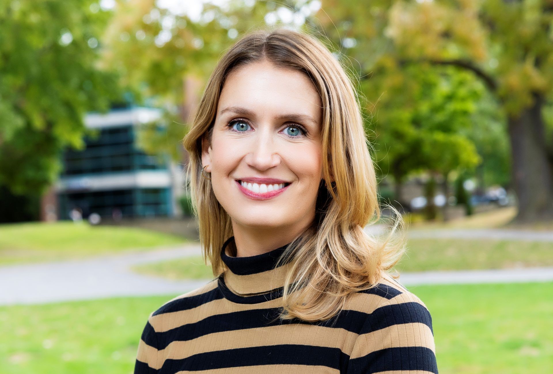 Smiling woman in striped sweater