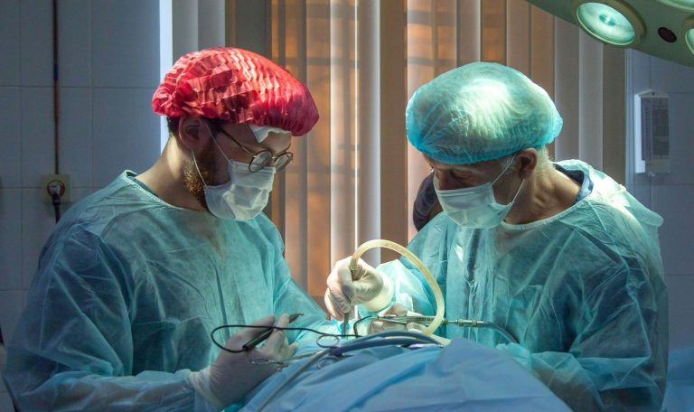 Surgeons performing an operation