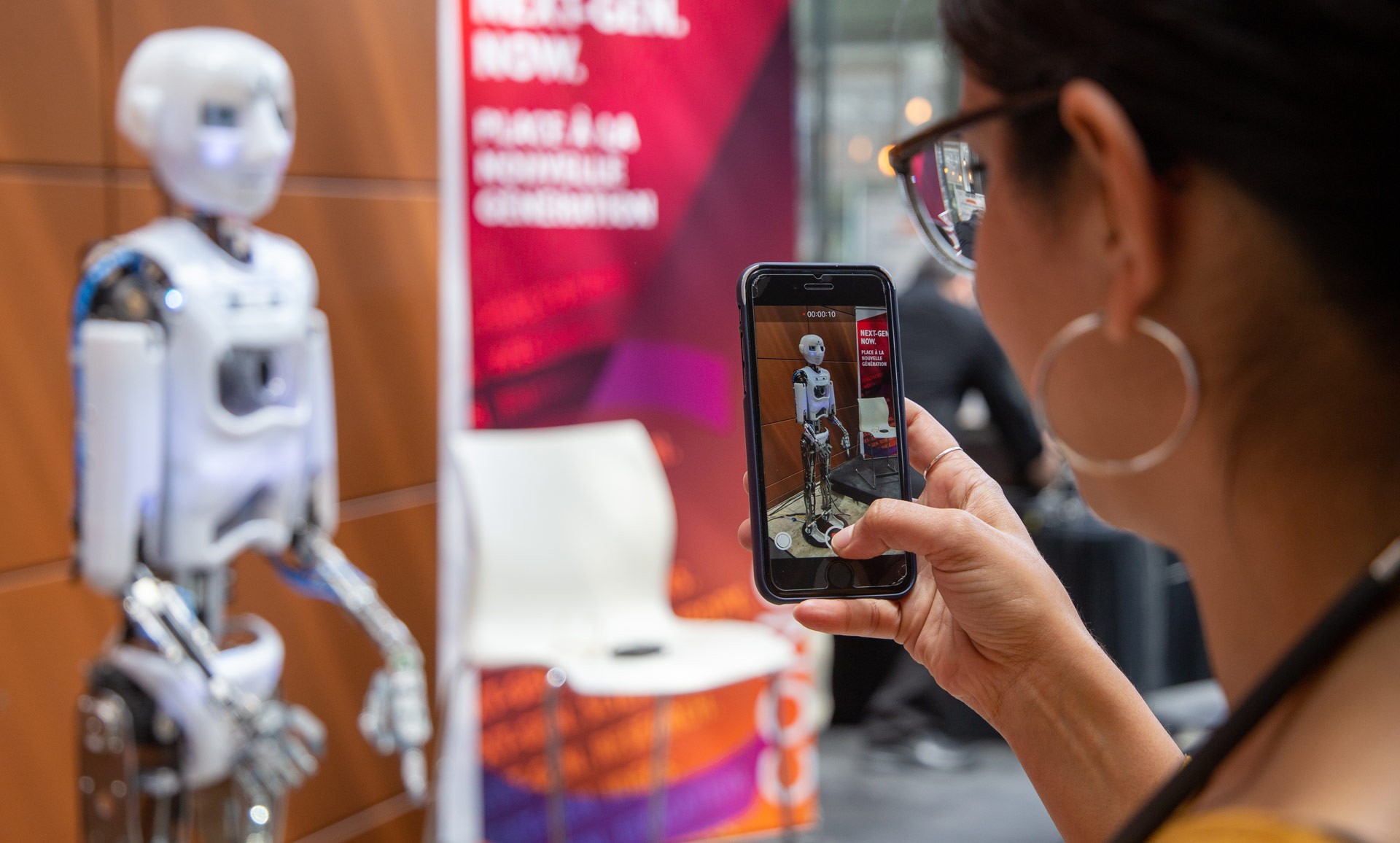 A student snaps an image of CODE-E at Concordia. 