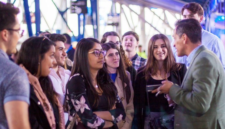 Montreal Impact’s director of corporate partnerships Saverino Folino (far right) took the students on a tour of the stadium.  | Photos by Katie Malazdrewicz