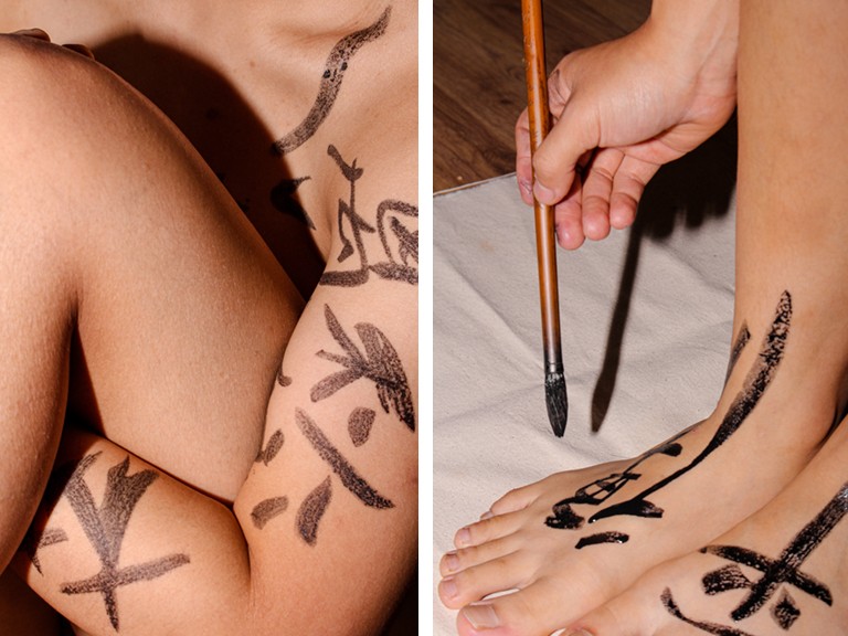 Design student Le Lin’s “我只穿了一条短裤 / I only wore a pair of shorts” and “回味 / Aftertaste,” 2019 — two artist books in a series that explores queer diasporic sentiments from 潮州 / Teochew. | Courtesy of the artist Calligraphy written on skin with black paint