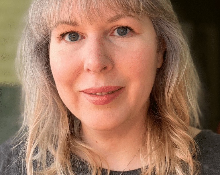 Denise Brend: “Much of the distress is related to issues with the functioning of the youth justice system itself.” Smiling woman with long blonde hair.