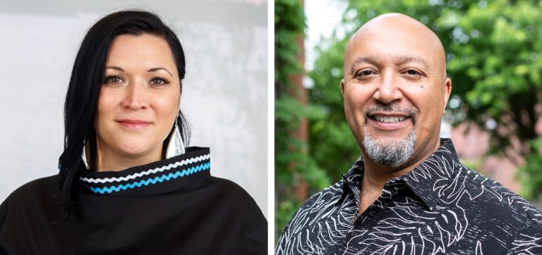 On the left: a smiling woman with long dark hair and a black top; on the right: A smiling bald man with a beard and a patterned shirt.