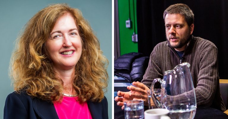 Pictured: On the left, a smiling woman with long, red hair. On the right: A man in mid-conversation, with short, dark hair and a brown sweater.