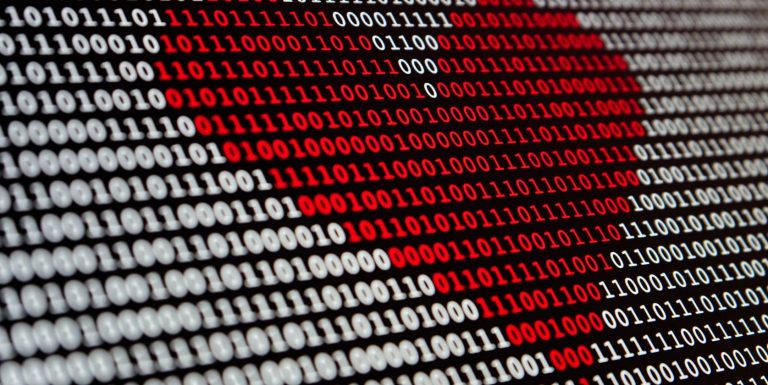 Illustration of a red heart over binary code