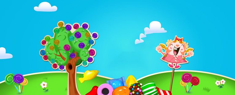 Colourful computer graphic from an online game, with a blue sky, green grass, a cartoon tree, candies and a candy figure.