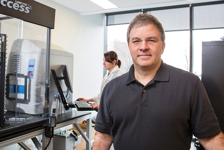Vincent Martin, the Concordia University Research Chair in Microbial Engineering and Synthetic Biology. Middle-aged man with glasses and wearing a black polo-neck T-shirt.