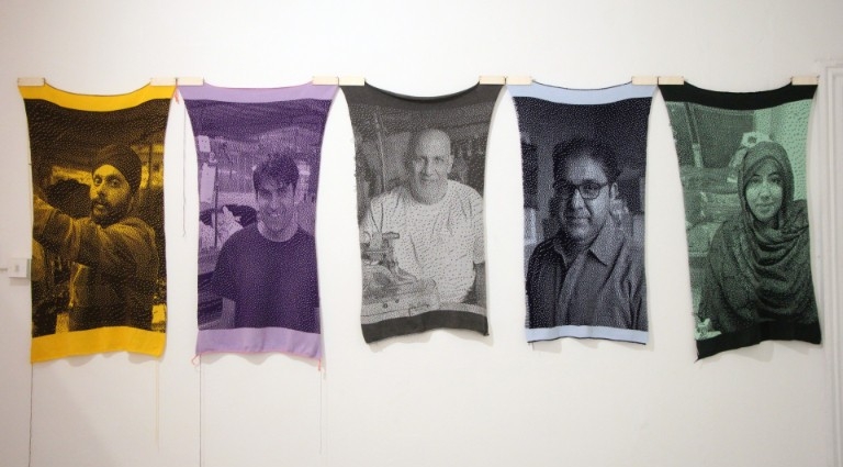 Knitted portraits 5 knitted portraits: one yellow, purplem grey, blue and green.
