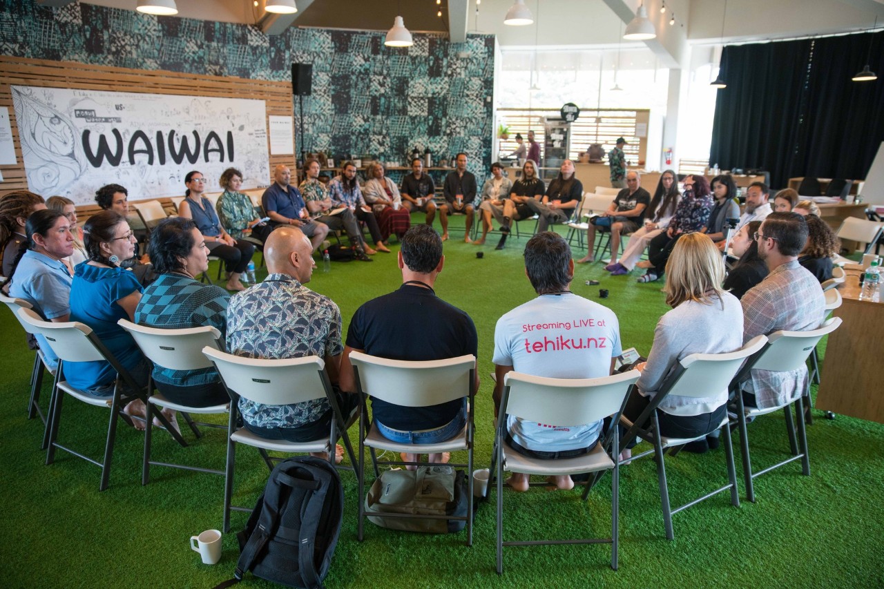 Group of people sitting in a circle 