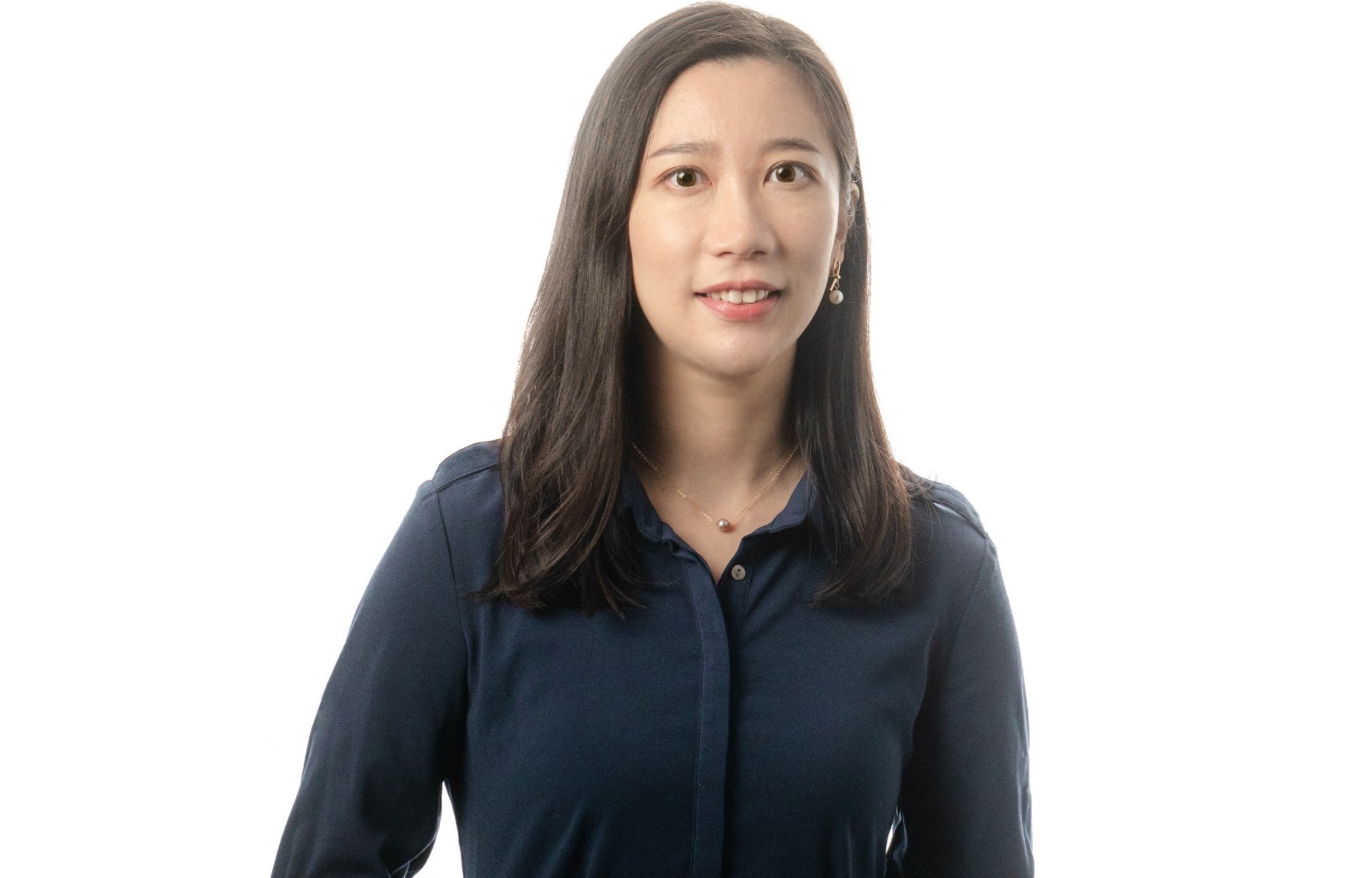Yuyan Wei: “We wanted to link green strategy efforts to firms’ financial performance." | Photo: David Ward Yuyan Wei has long black hair and wears a blue shirt