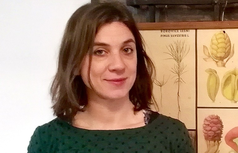 Daniela Giudici: “I am really enjoying the vibrant community of scholars and researchers at Concordia.” Smiling woman with shoulder-length brown hair, wearing a green top.
