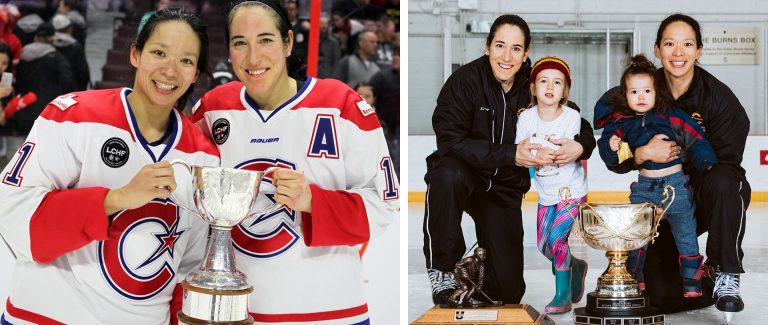 Two smiling women in hockey gear, with trophies, and on the right-hand side, with two young children.