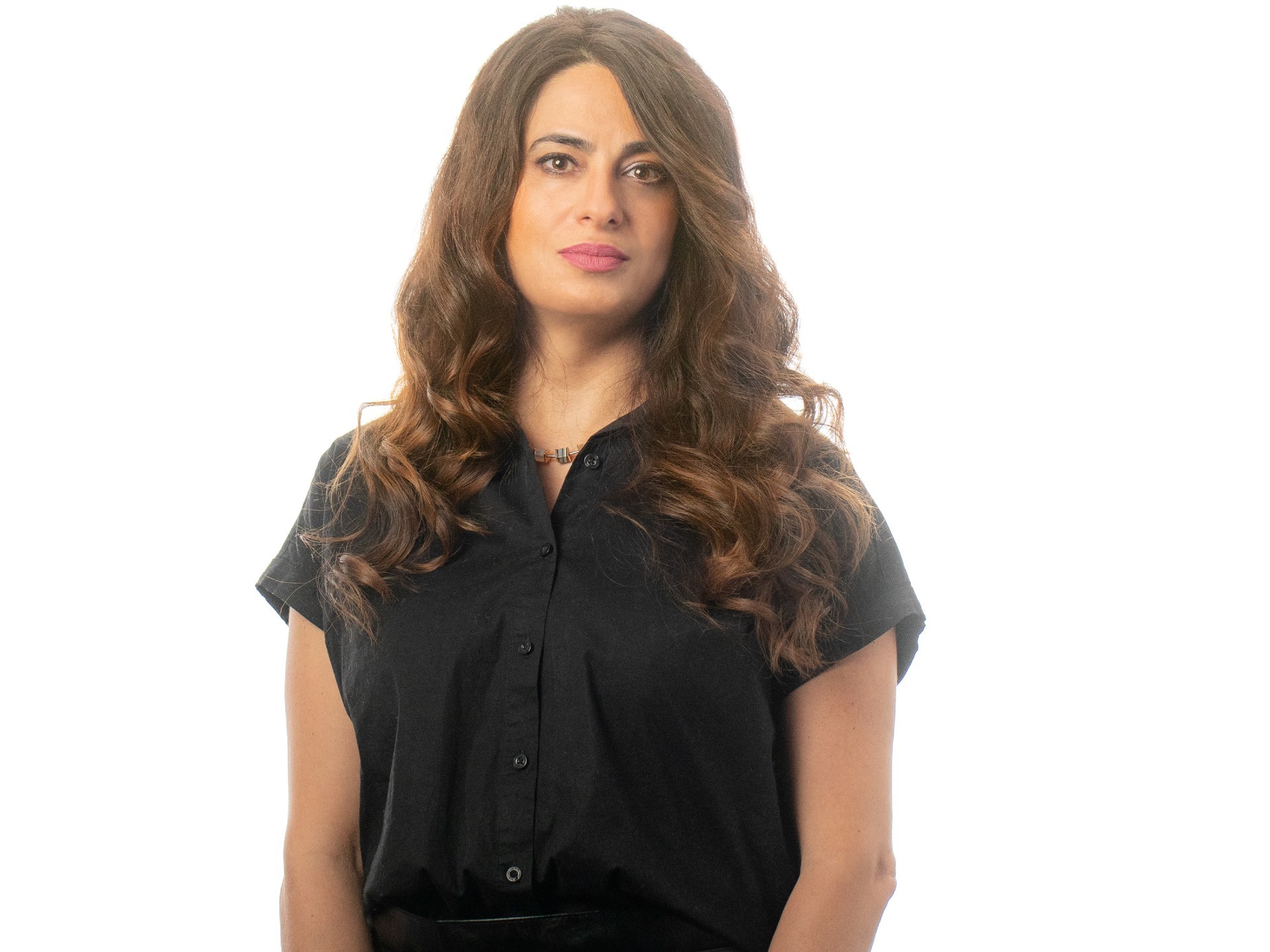 Caroline Hachem-Vermette A woman with long dark hair in a black shirt