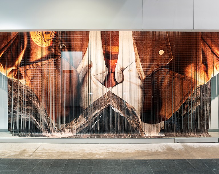 Vitrine artwork in browns and greys and whites