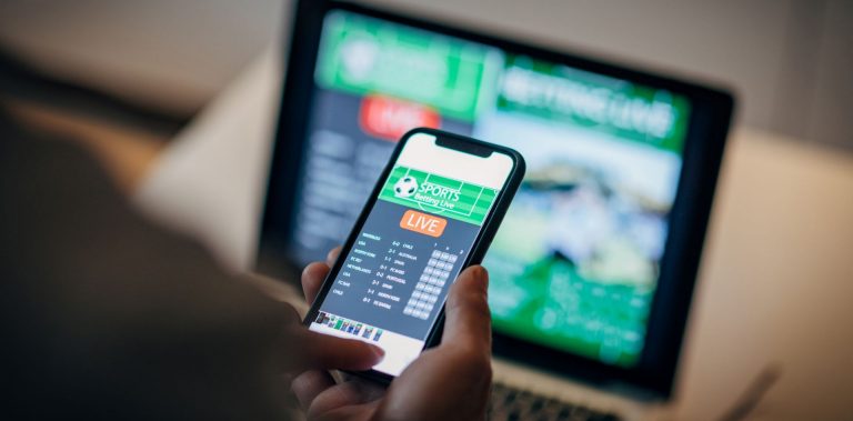 A person using a sports gambling app