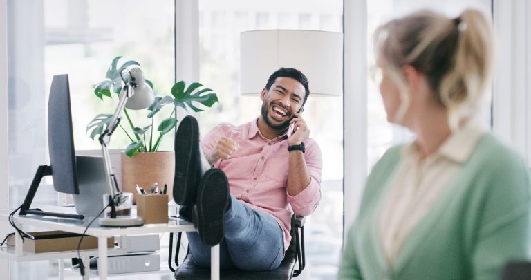 A man's laugh bothers a colleague