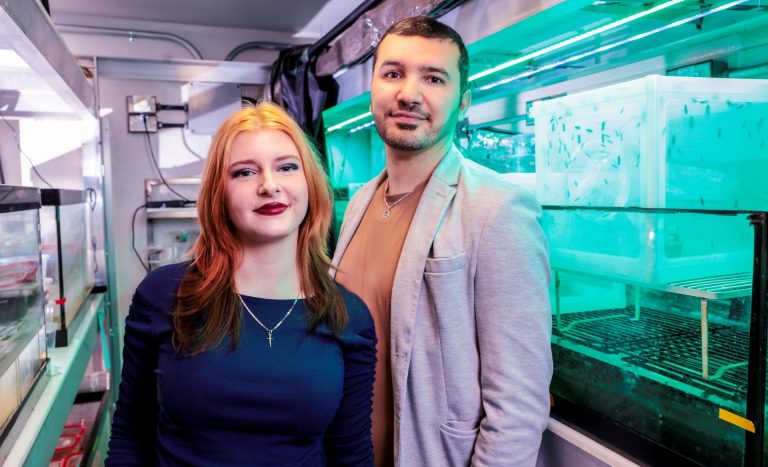 A female and male scientist in a lab