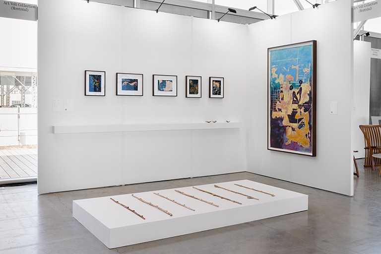 Paintings hanging on walls in an art gallery