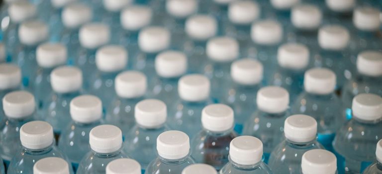 Many plastic water bottles