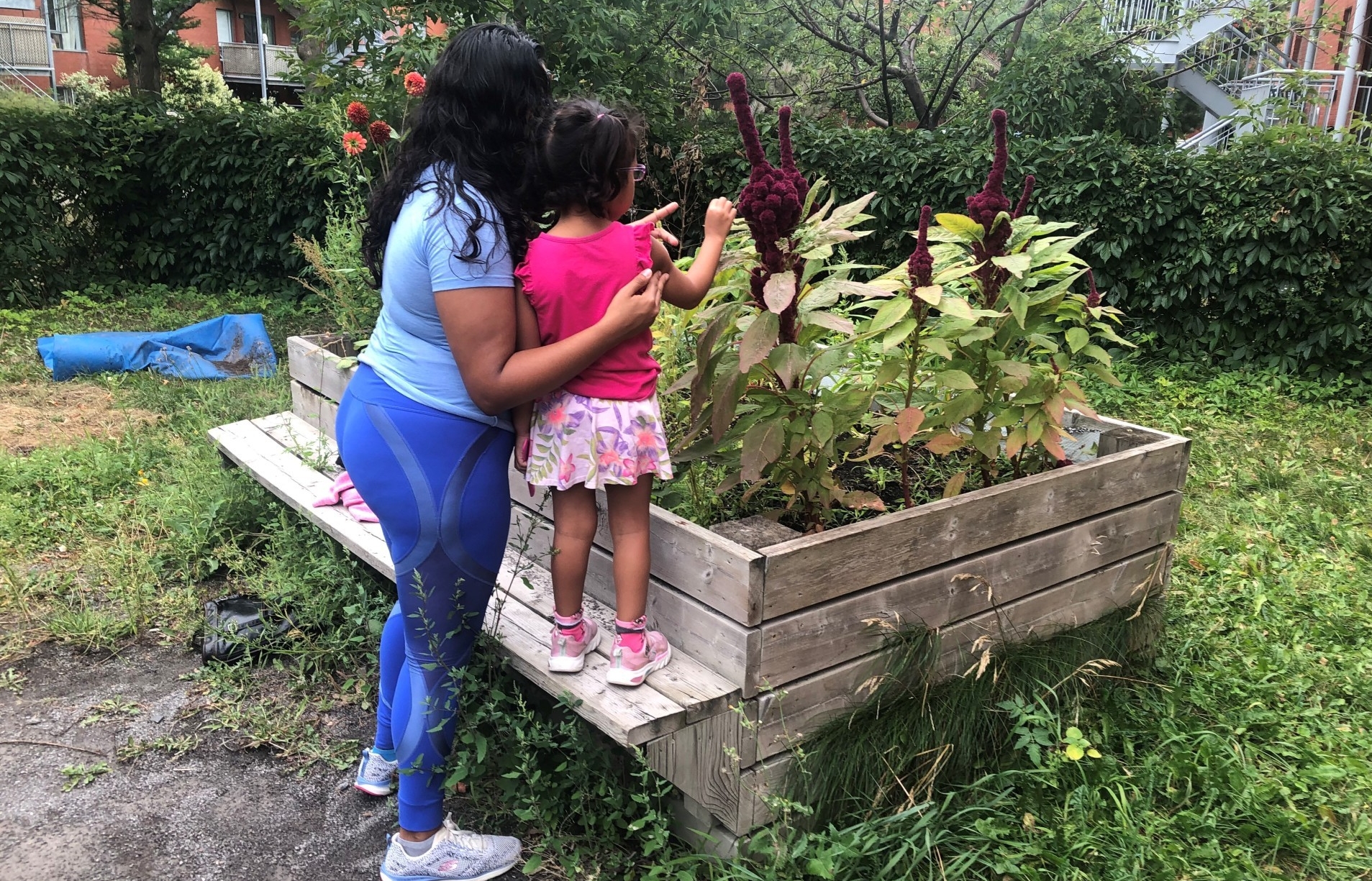 On Our Own resident and her daughter in the garden